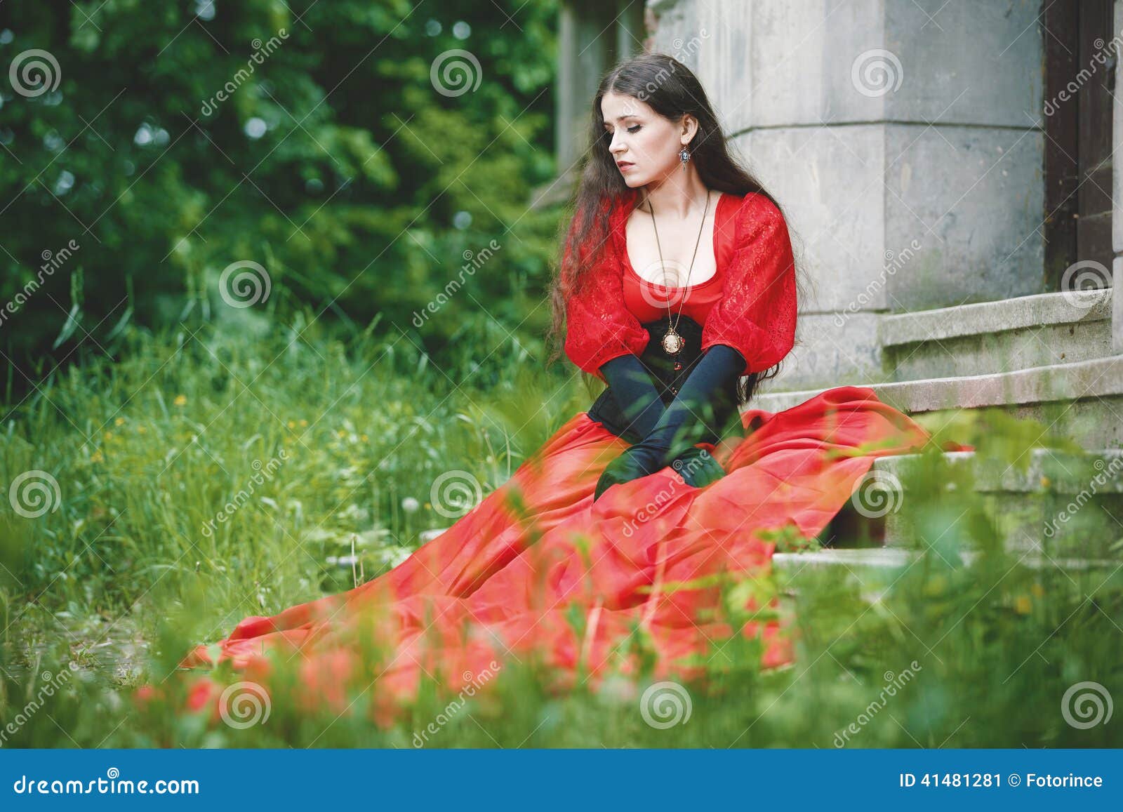 woman in red victorian dress