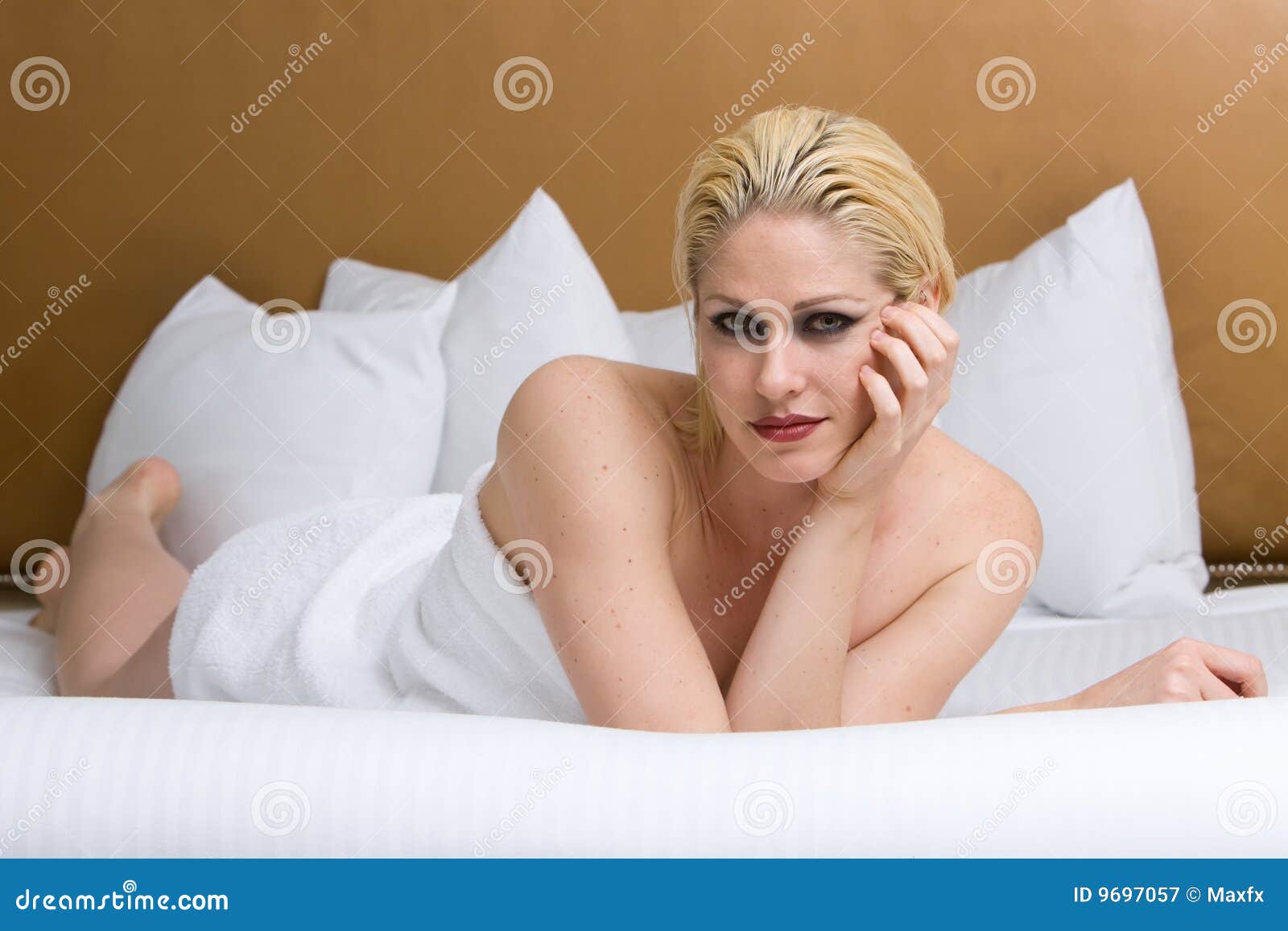 Beautiful woman relaxing on bed