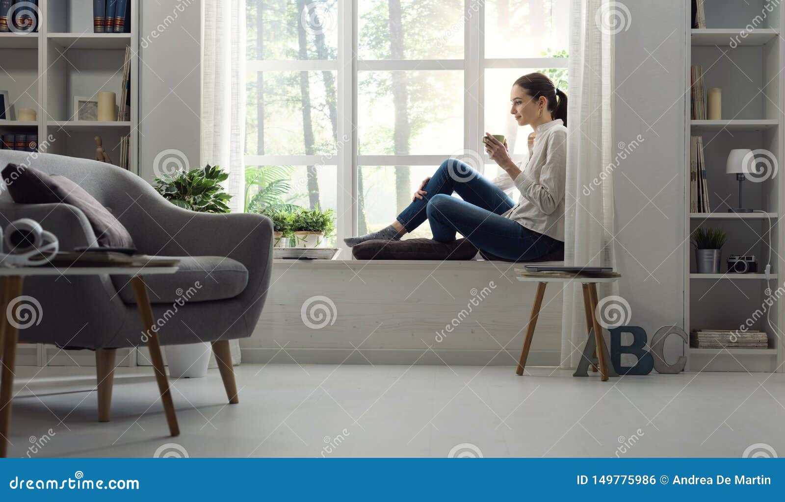 woman relaxing at home and having coffee
