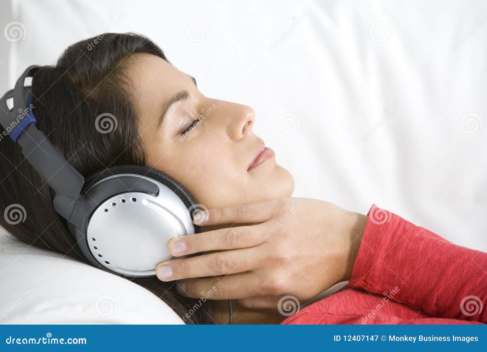 woman relaxing listening to music