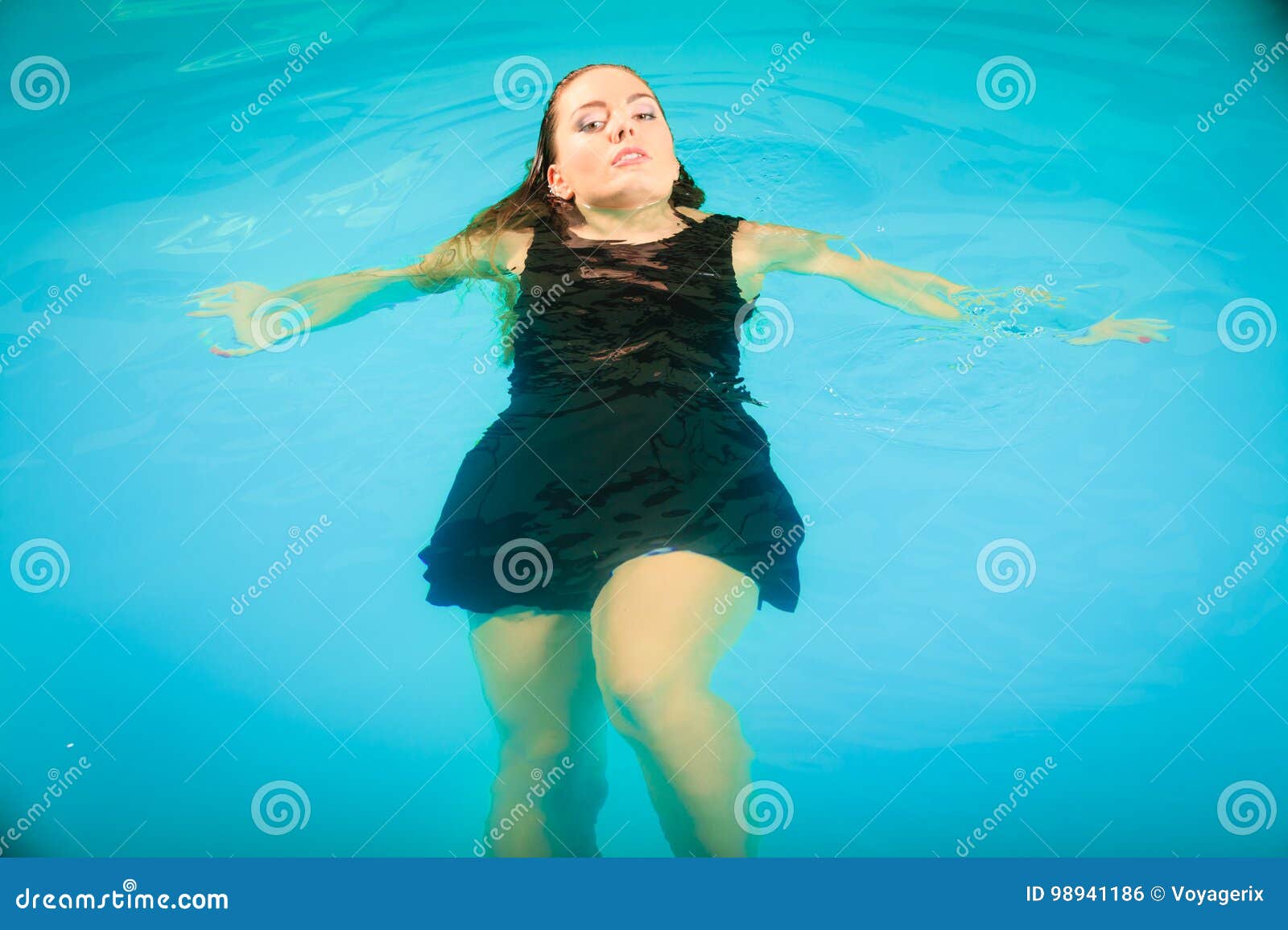 Woman Floating Relaxing in Swimming Pool Water. Stock Photo - Image of ...