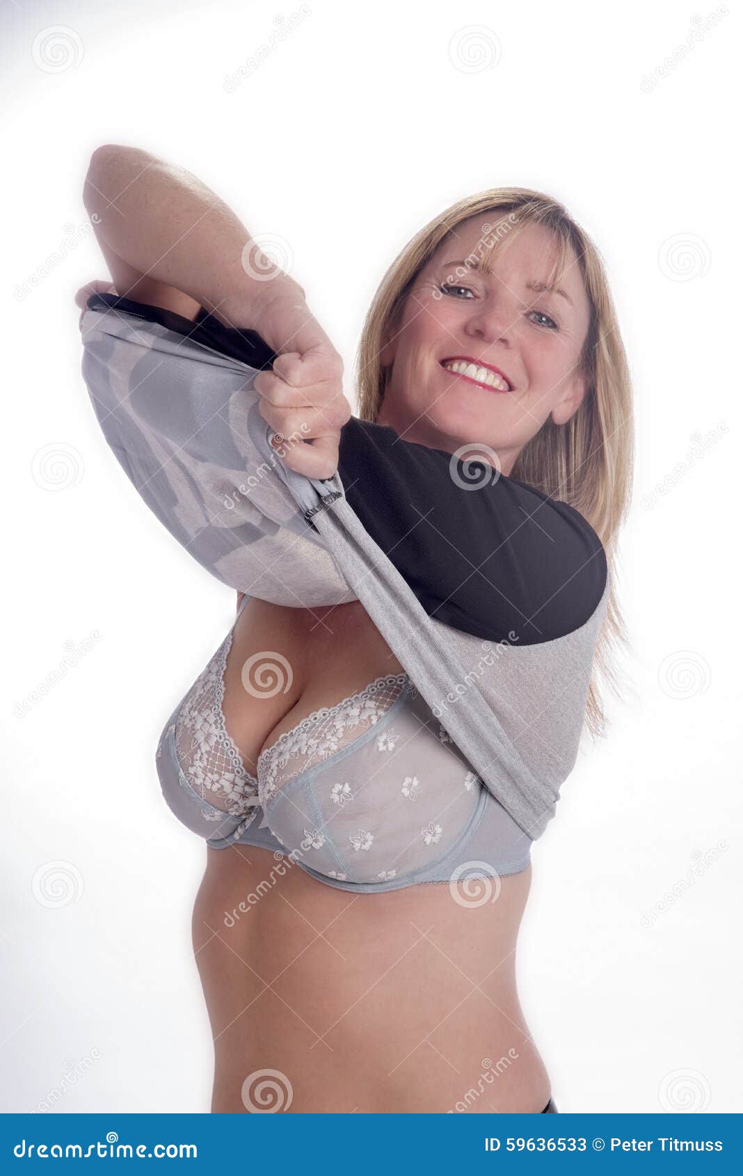 Mature Woman Undressing Stock Photos photo