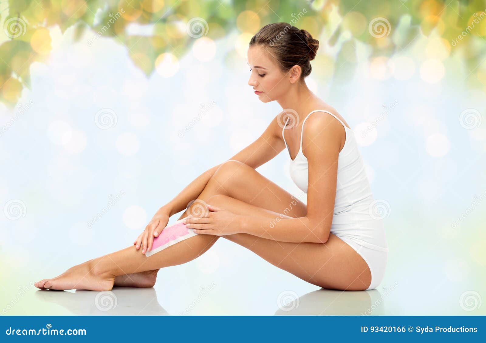 Woman Removing Leg Hair with Depilatory Wax Strip Stock Photo - Image of  people, background: 93420166