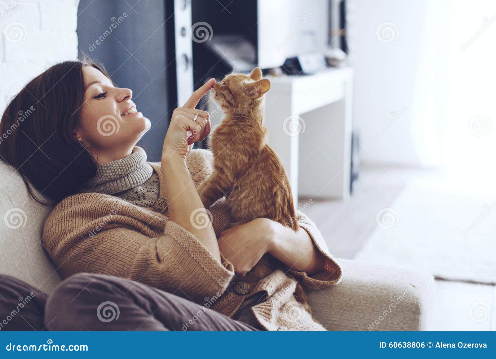 woman resting with kitten