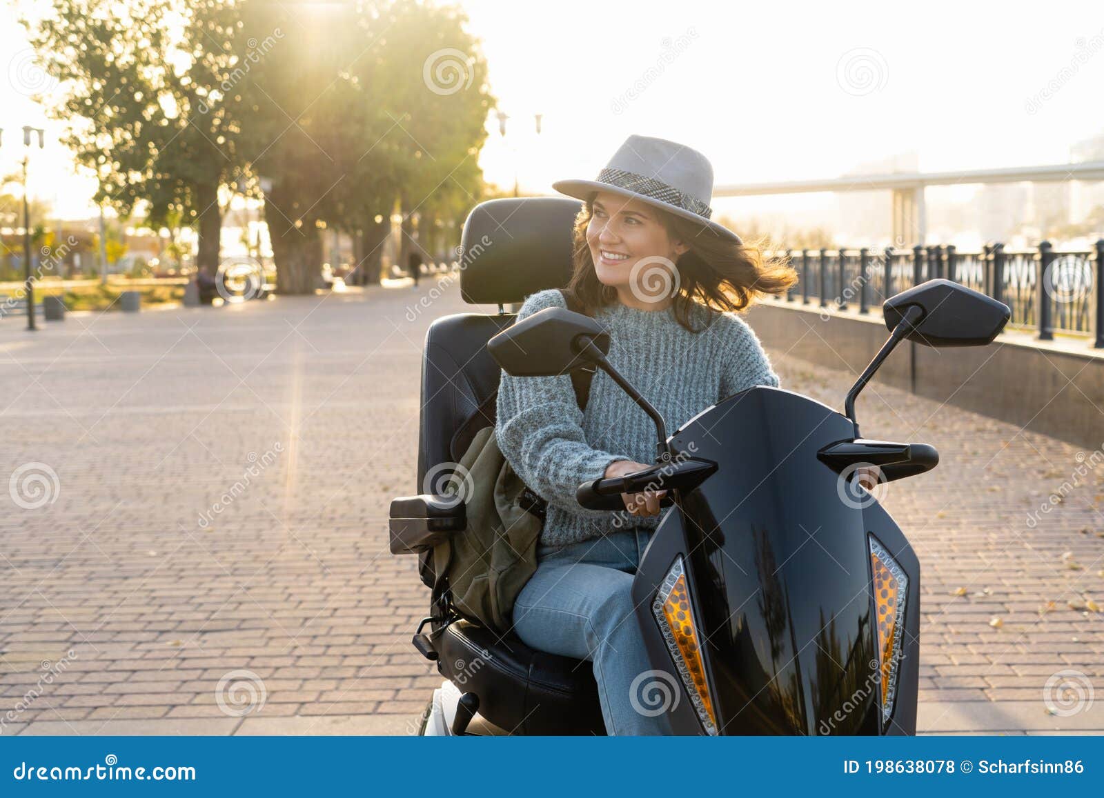 woman riding an electric scooter