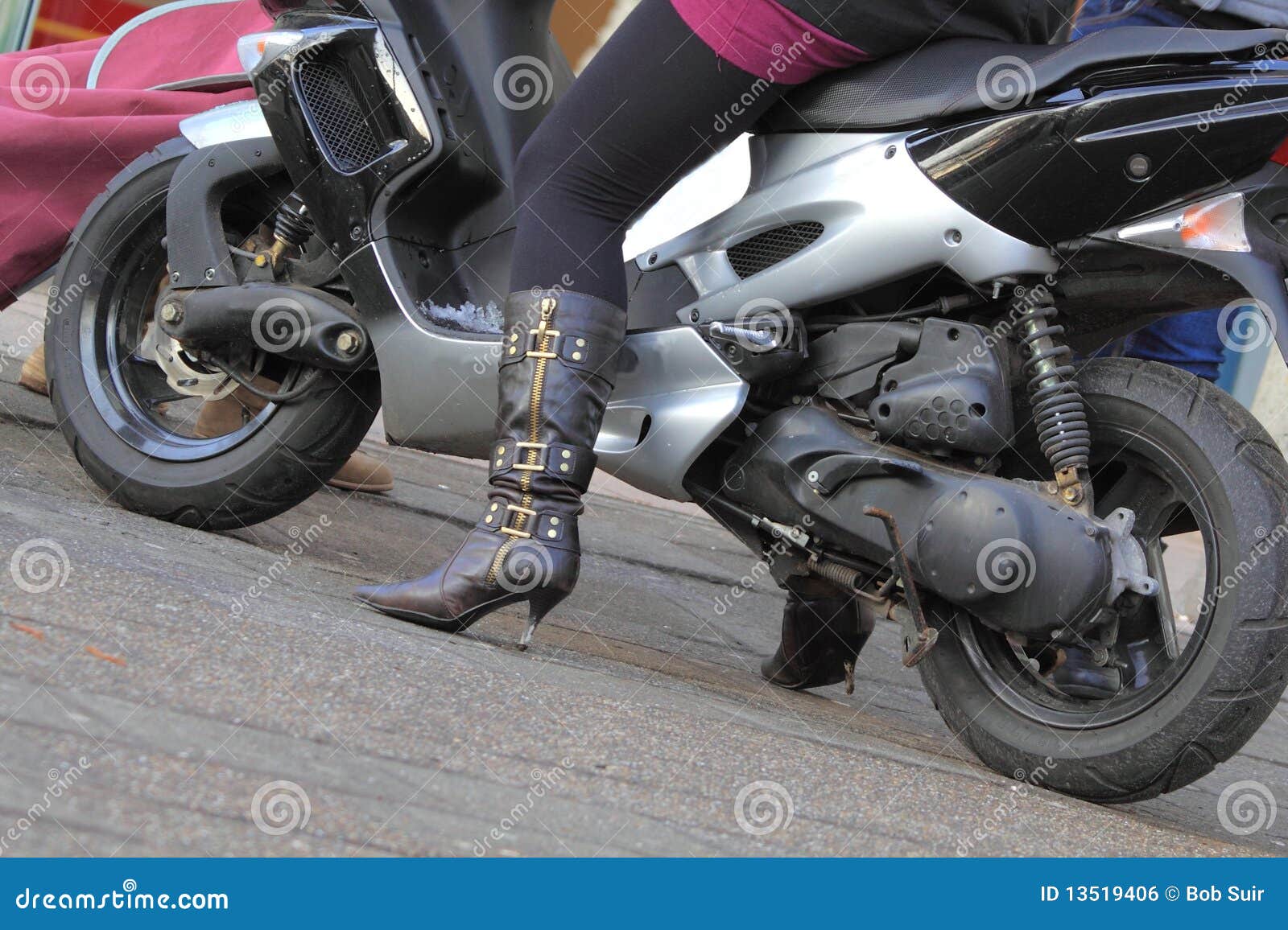 girl riding moped