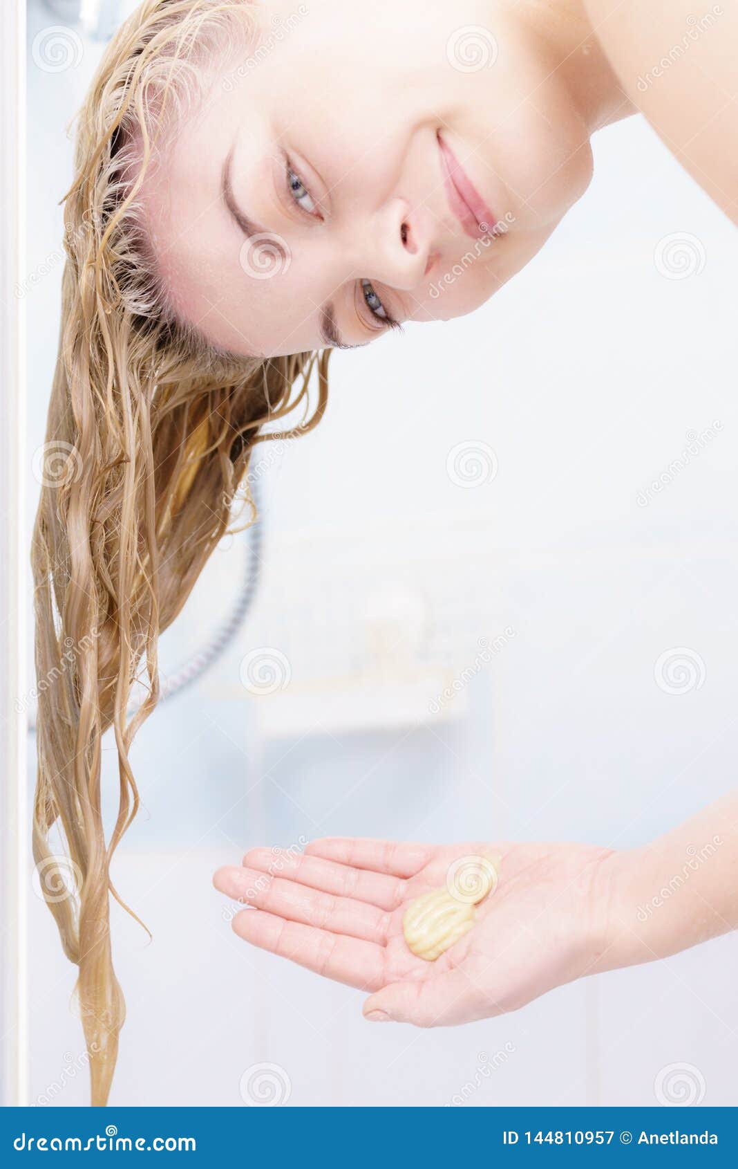 woman having wet blonde hair