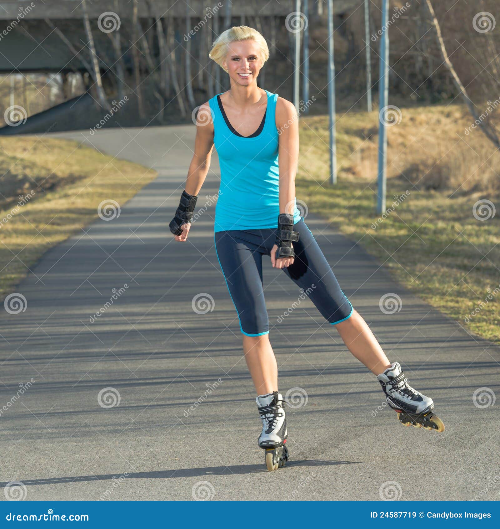 Woman Roller Skating in Park Smiling Summer Stock Image Image of