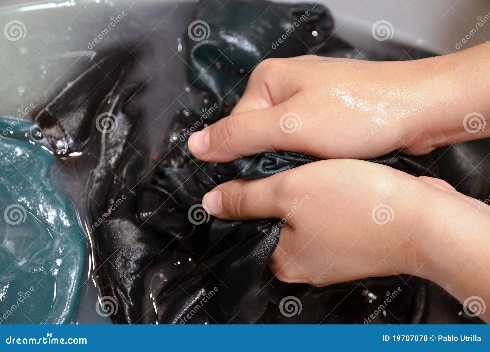 Woman rubbing clothing stock photo. Image of women, cleaning 19707070