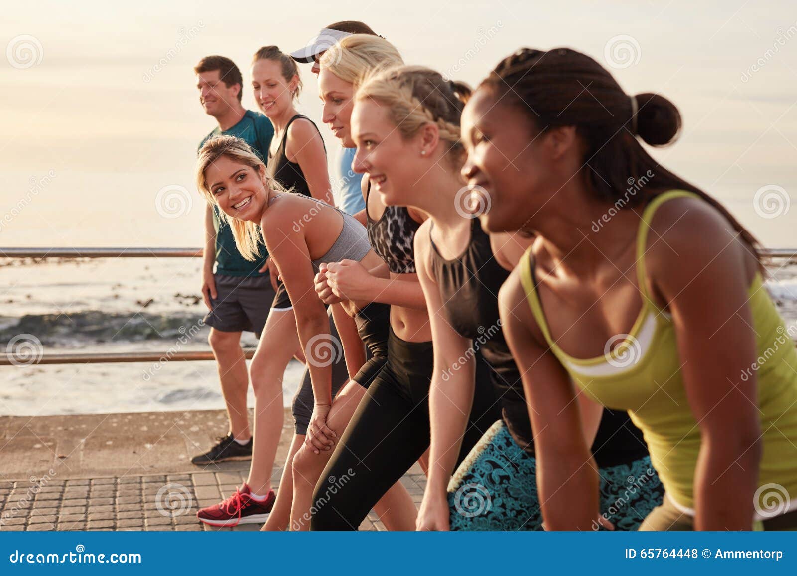 Woman with Running Club Group Stretching after a Run Stock Photo - Image of  active, friendship: 65764448
