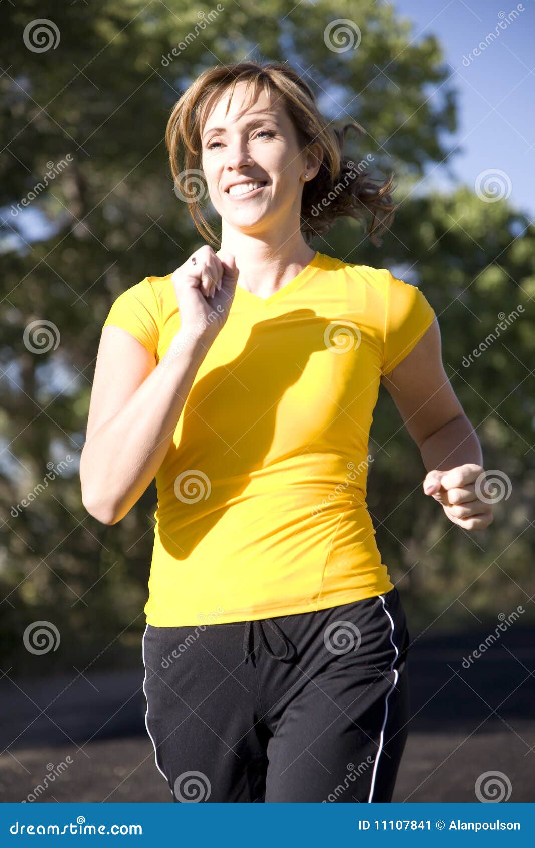 Woman Running in Yellow Shirt Stock Image Image of shape, nature