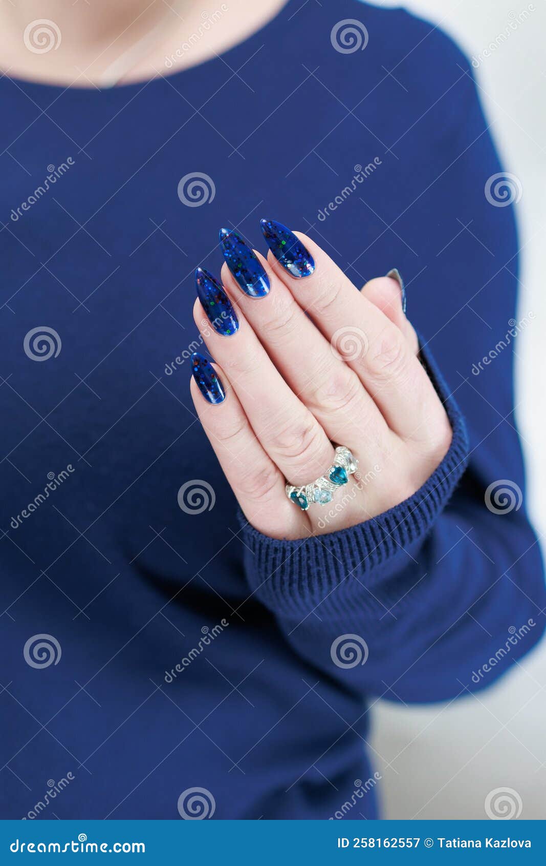 A young adult woman beautiful hand showcases vibrant nail art generated by  AI 27901883 Stock Photo at Vecteezy