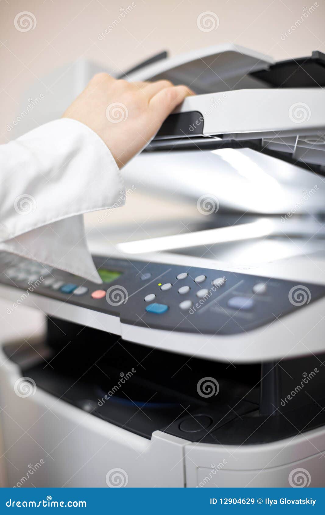 Woman s hand with copier. Woman s hand with working copier