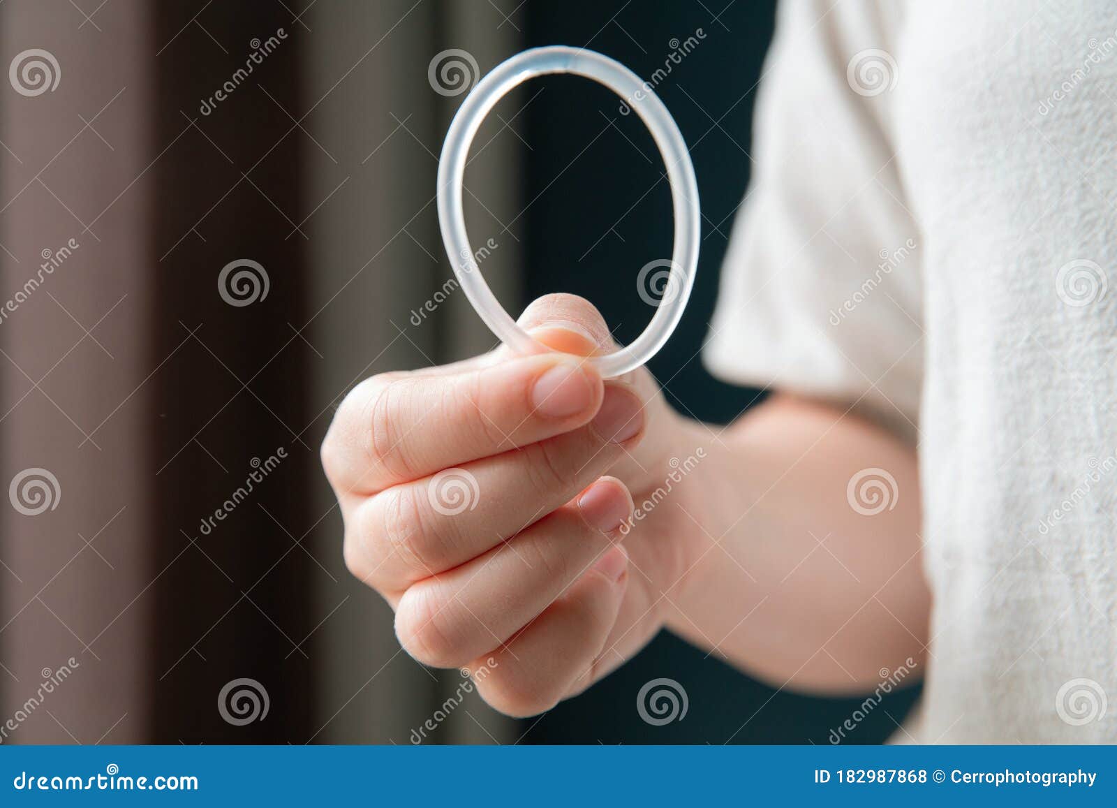 woman`s hand holding a birth control ring, vaginal ring for contraceptive