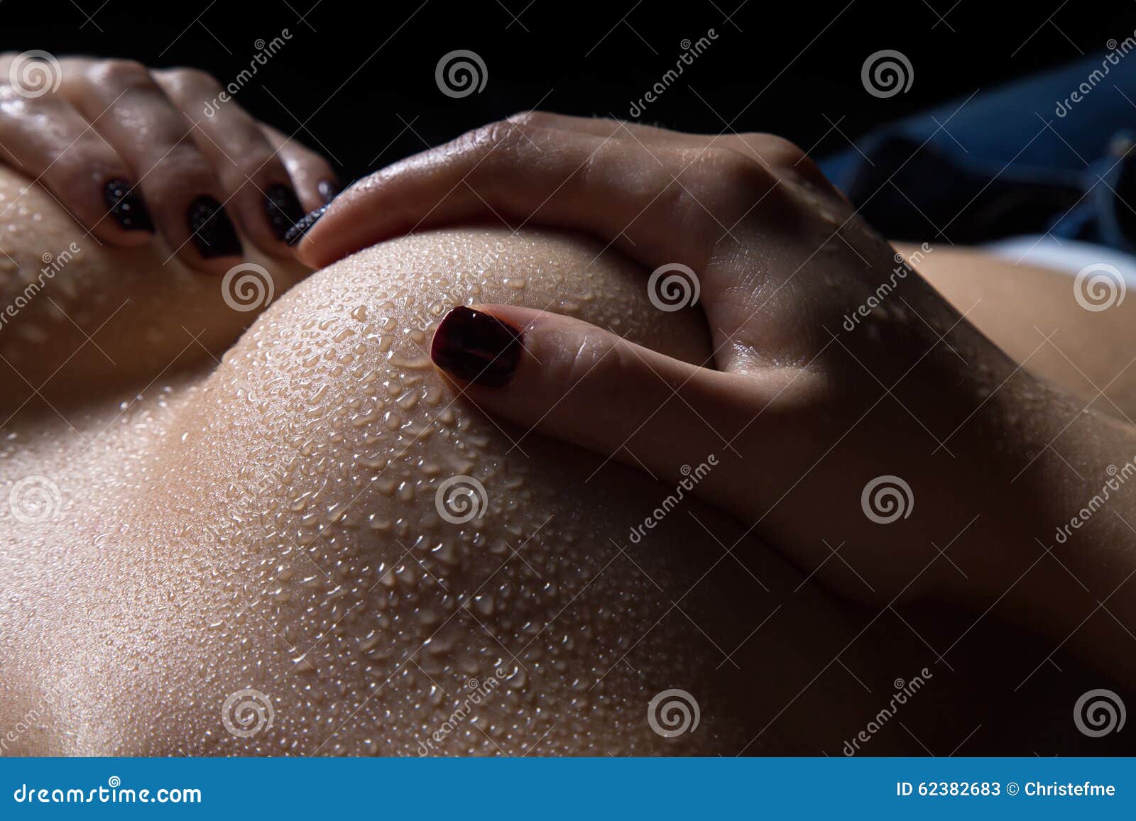 Woman S Hand Holding Breast with Drops Close Up Stock Image - Image of  body, exciting: 62382683