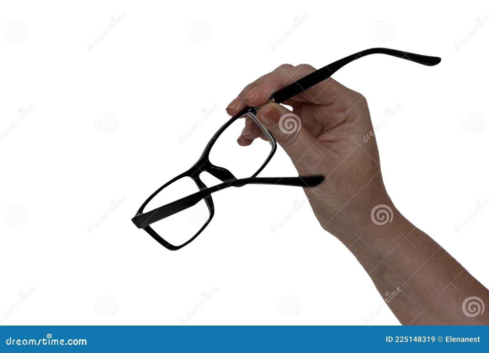a woman`s hand holding a glasses, 