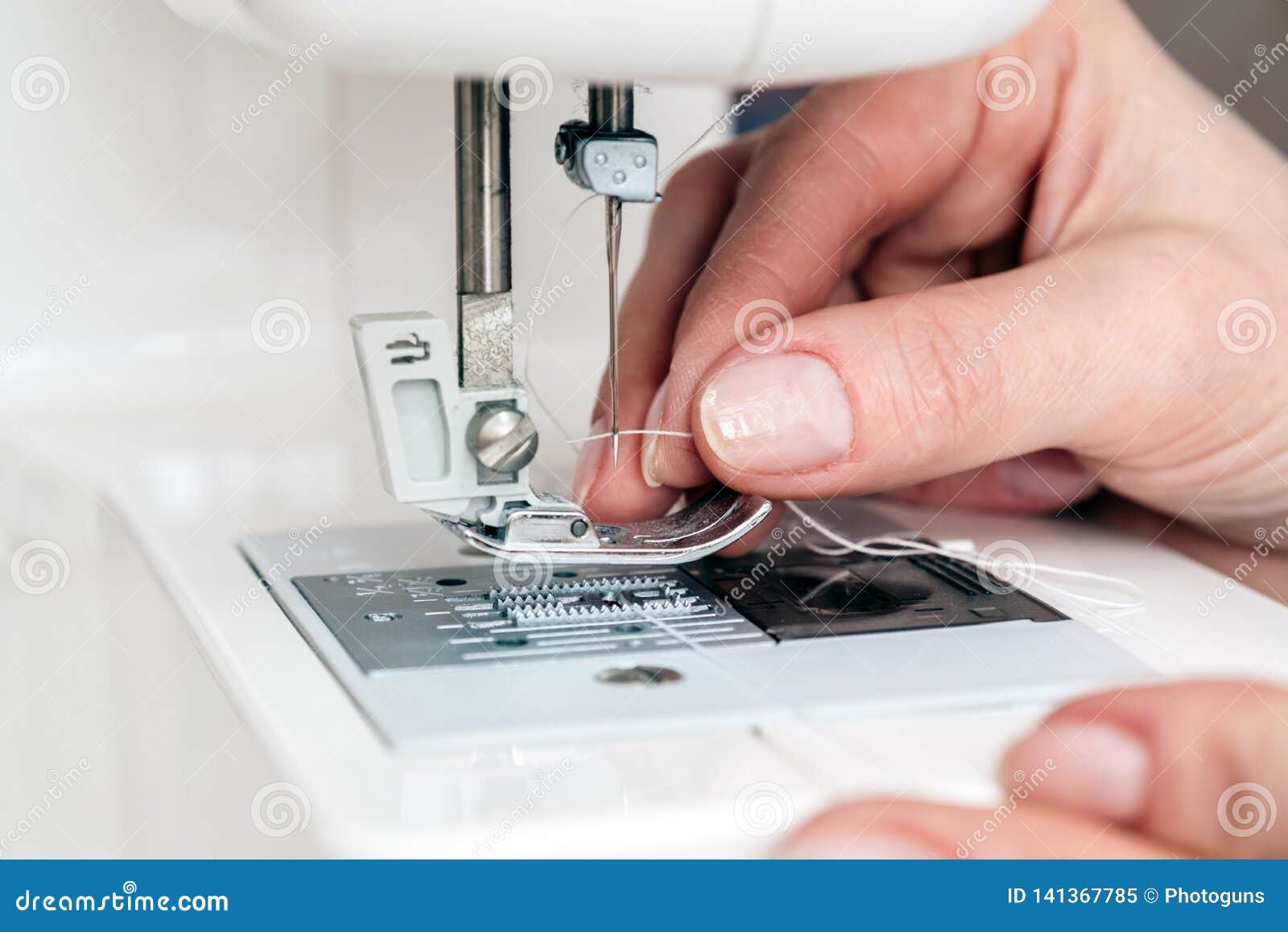 Thread and Threading a Sewing Machine Needle Stock Image Image of