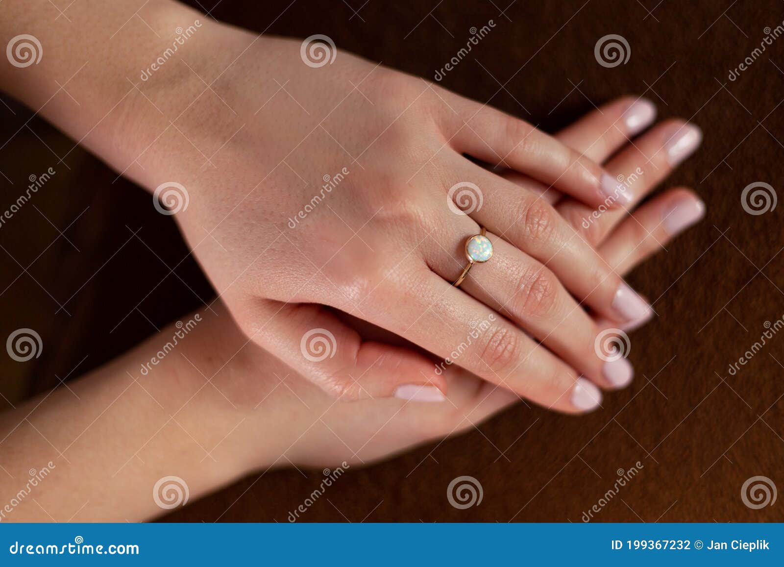 Hand, Fingers, of a Young Woman Wearing a Ring in the Middle Finger, Nail  Polish and Bangles. Stock Image - Image of young, ring: 171414423