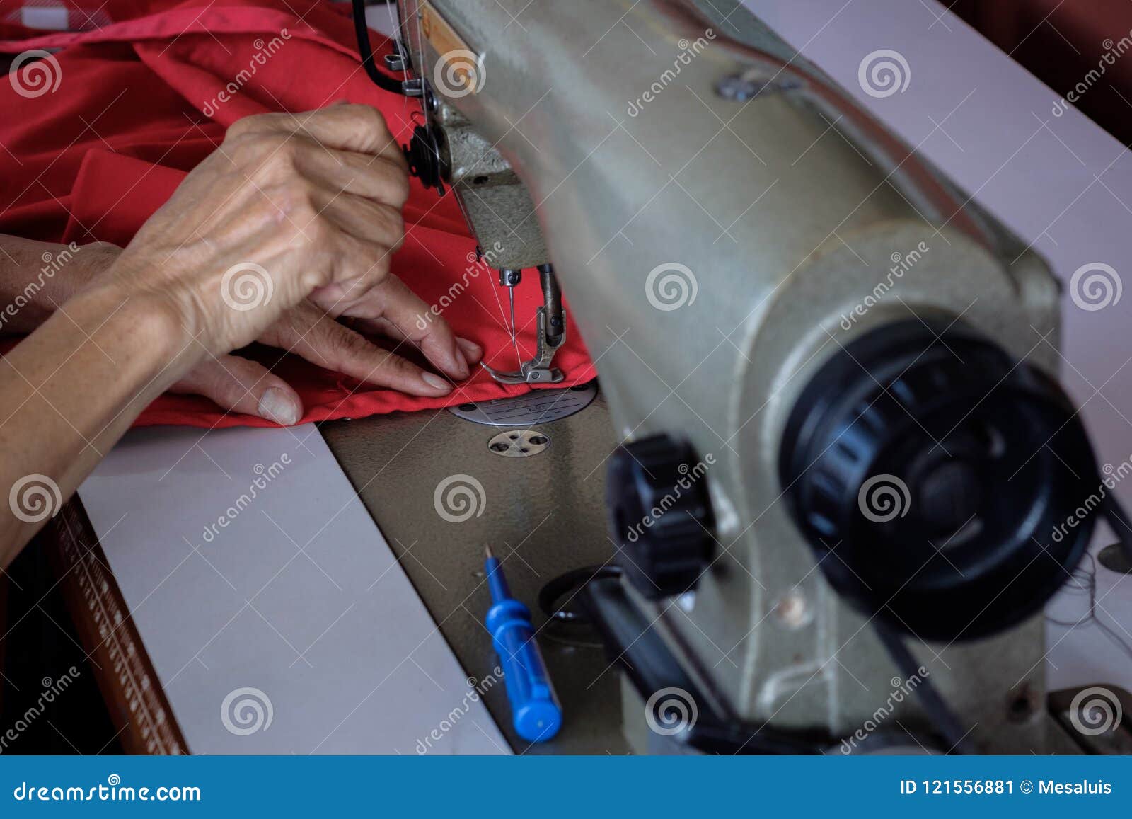 Woman`s Hands Sewing Fabric Repairs on Old Sewing Stock Image Image