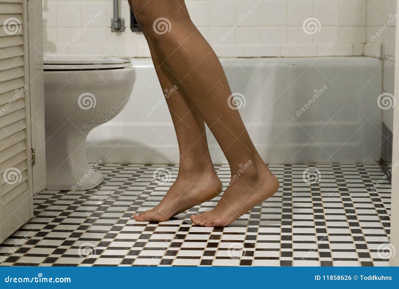 Woman s Legs in Bathroom stock photo. Image of female 11858626