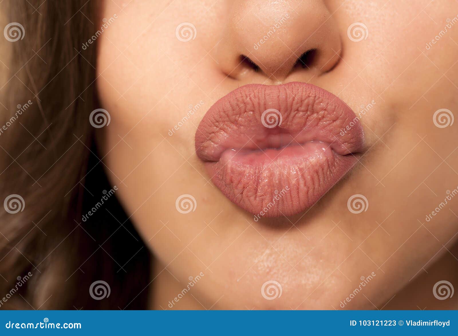 Pursed Lips RoyaltyFree Stock Photography 54940517