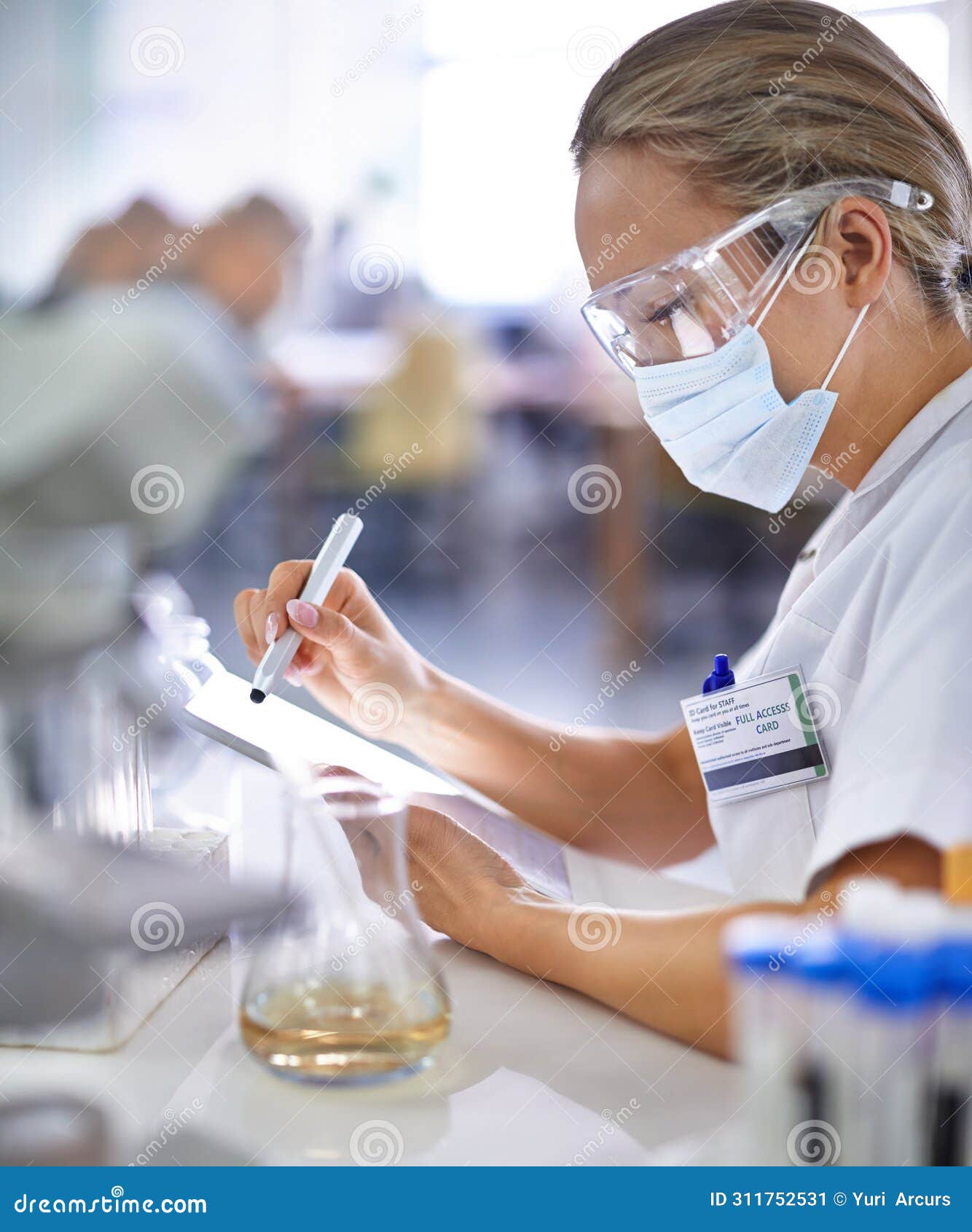 woman, scientist and writing with mask for research, checklist or test results from experiment at laboratory. female