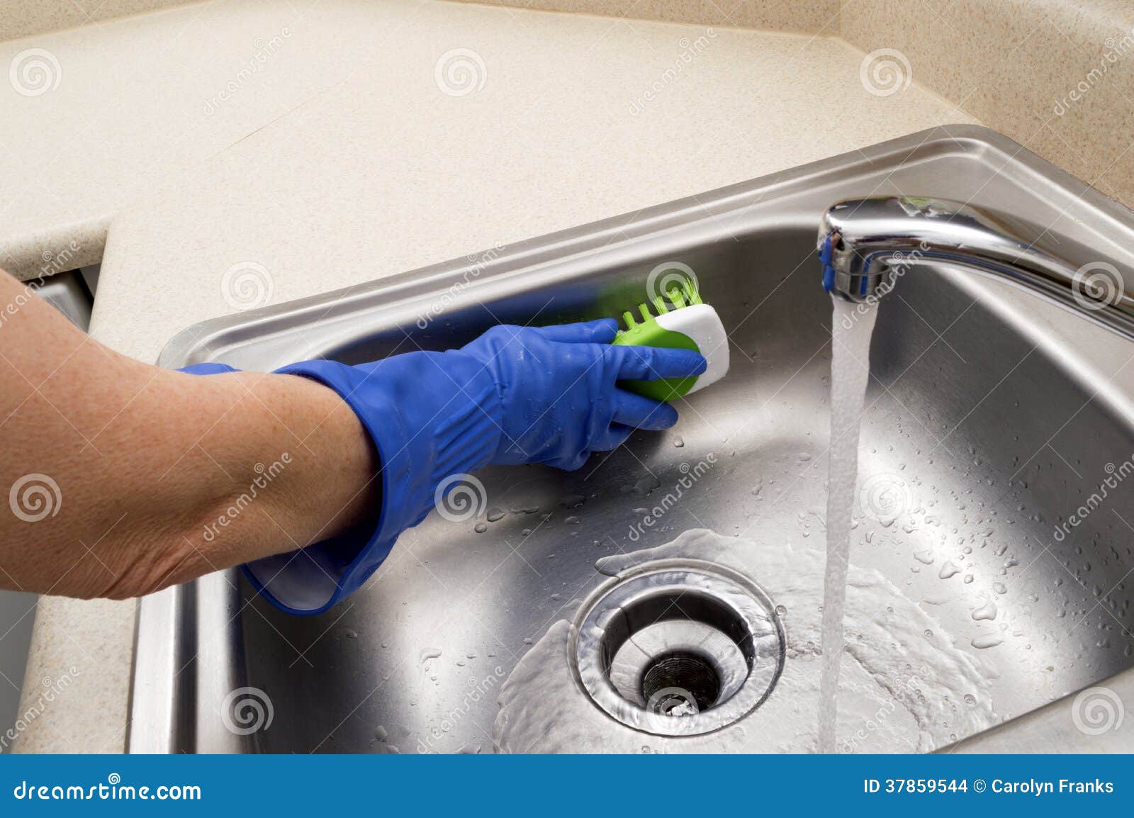woman scrubbing sink