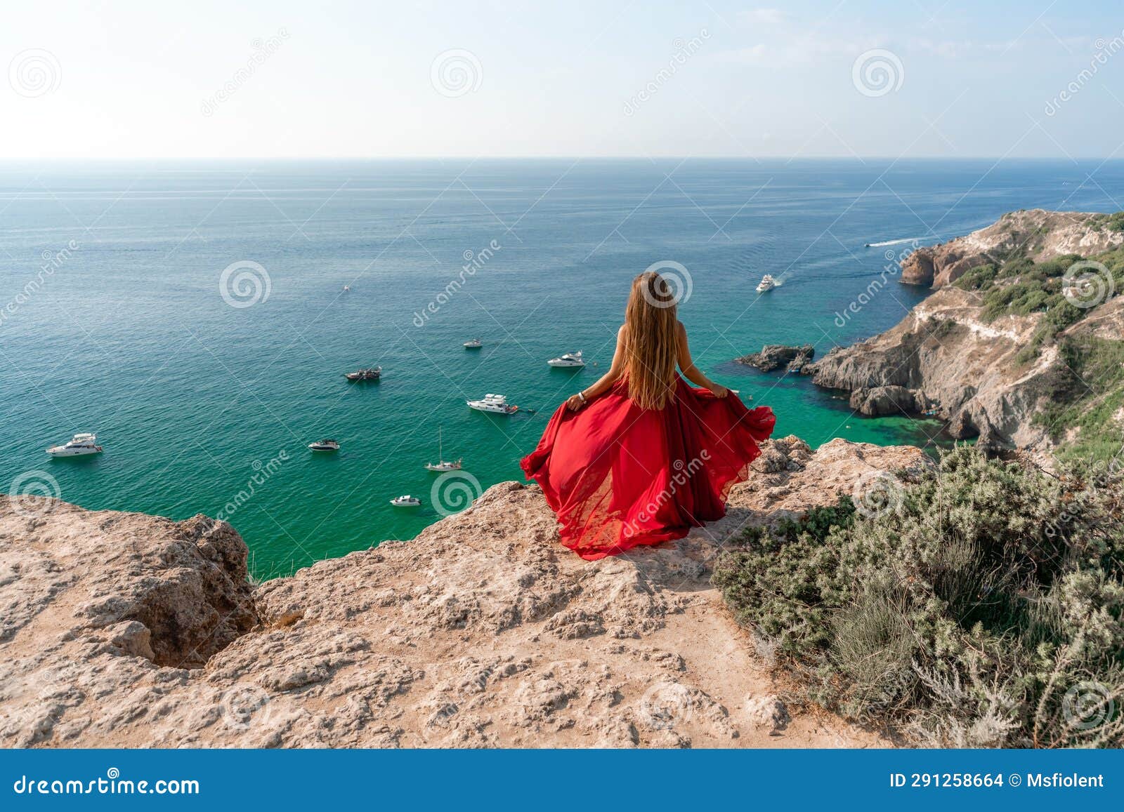 Woman Sea Red Dress Yachts A Beautiful Woman In A Red Dress Poses On A