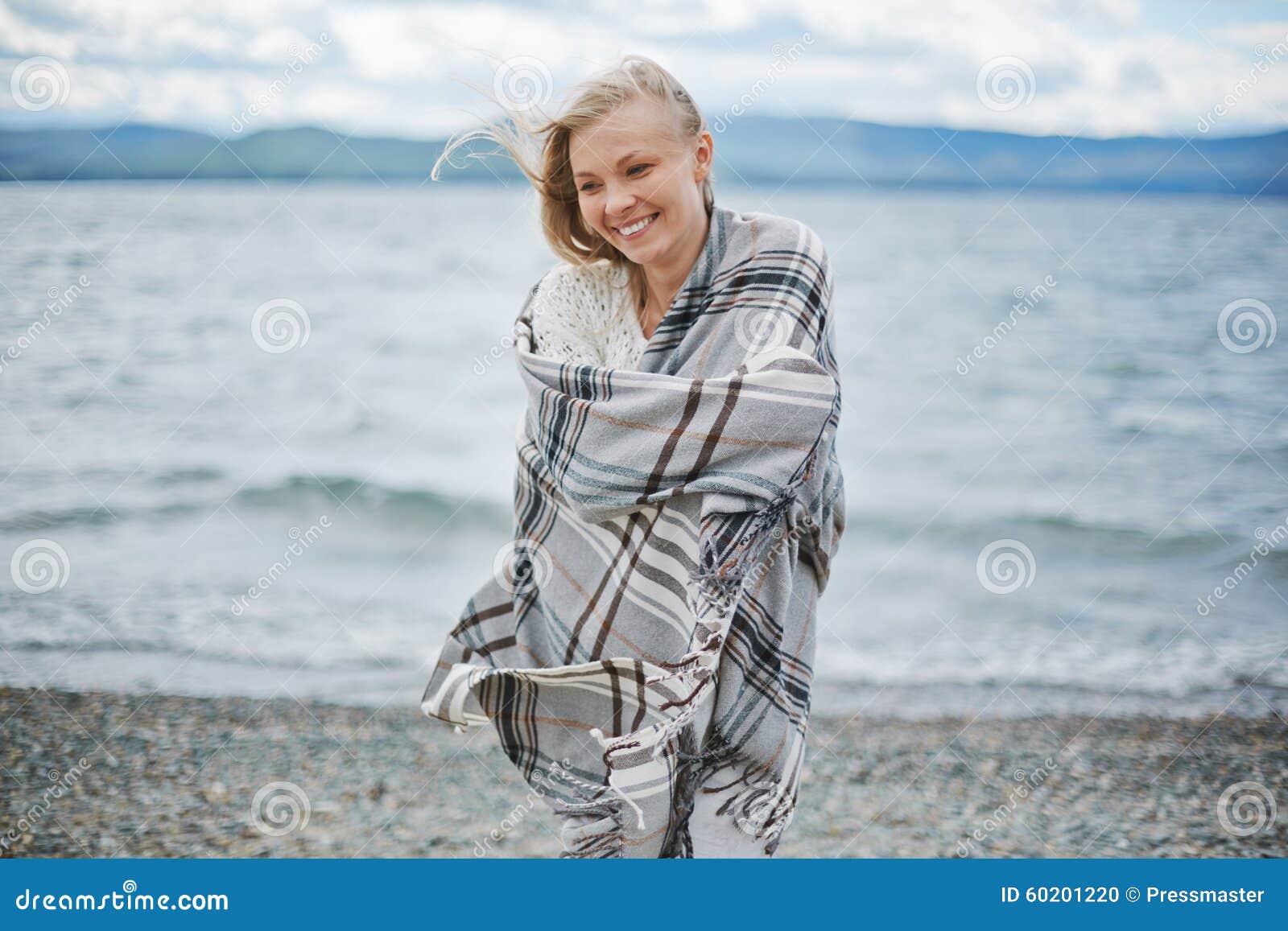 Woman by the seaside stock photo. Image of smiling, people - 60201220