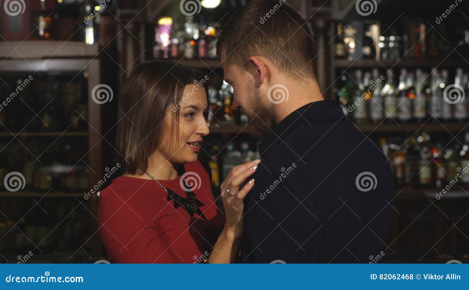 Woman Seducing a Man in a Bar and
