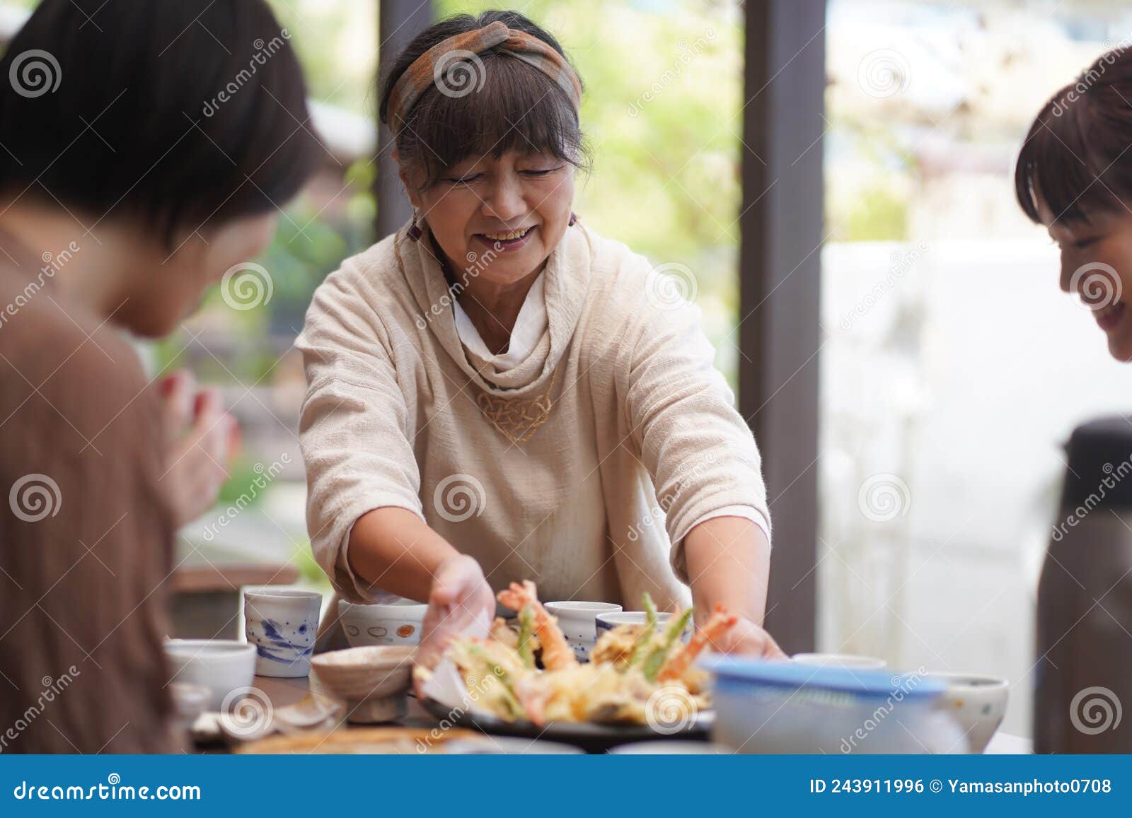 Woman serving a meal stock photo. Image of home, independent 243911996