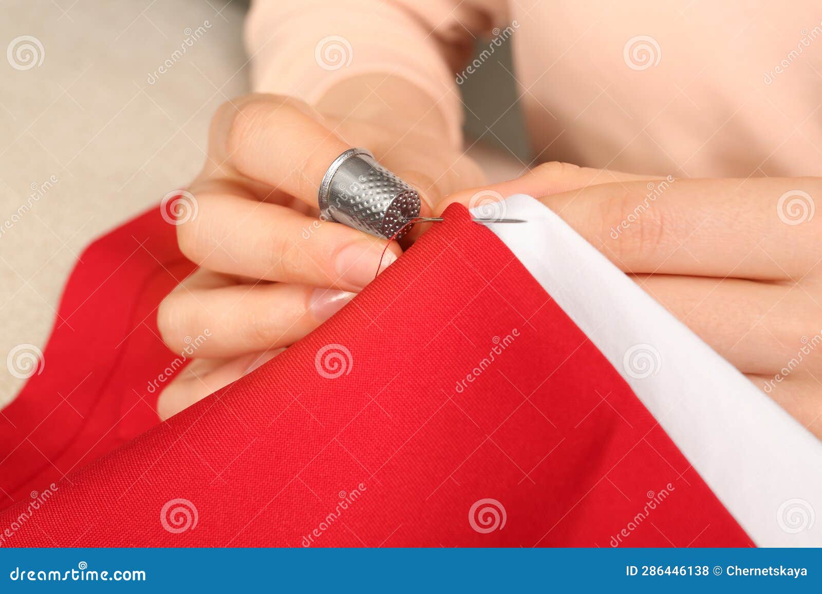 Woman Sewing on Red Fabric with Thimble and Needle, Closeup Stock Photo Image of fashion