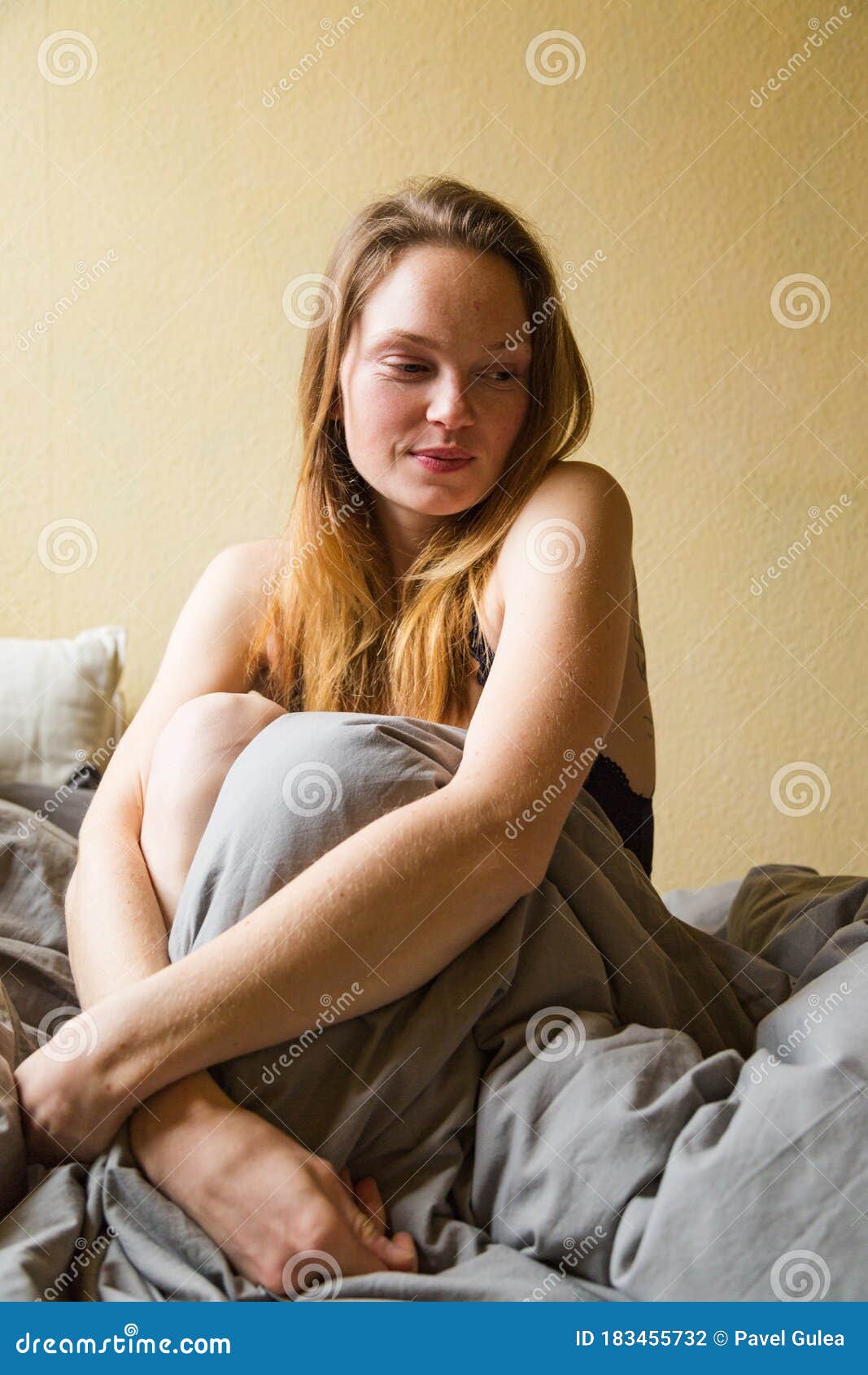 Woman in sexy underwear with half-naked breast Stock Photo - Alamy