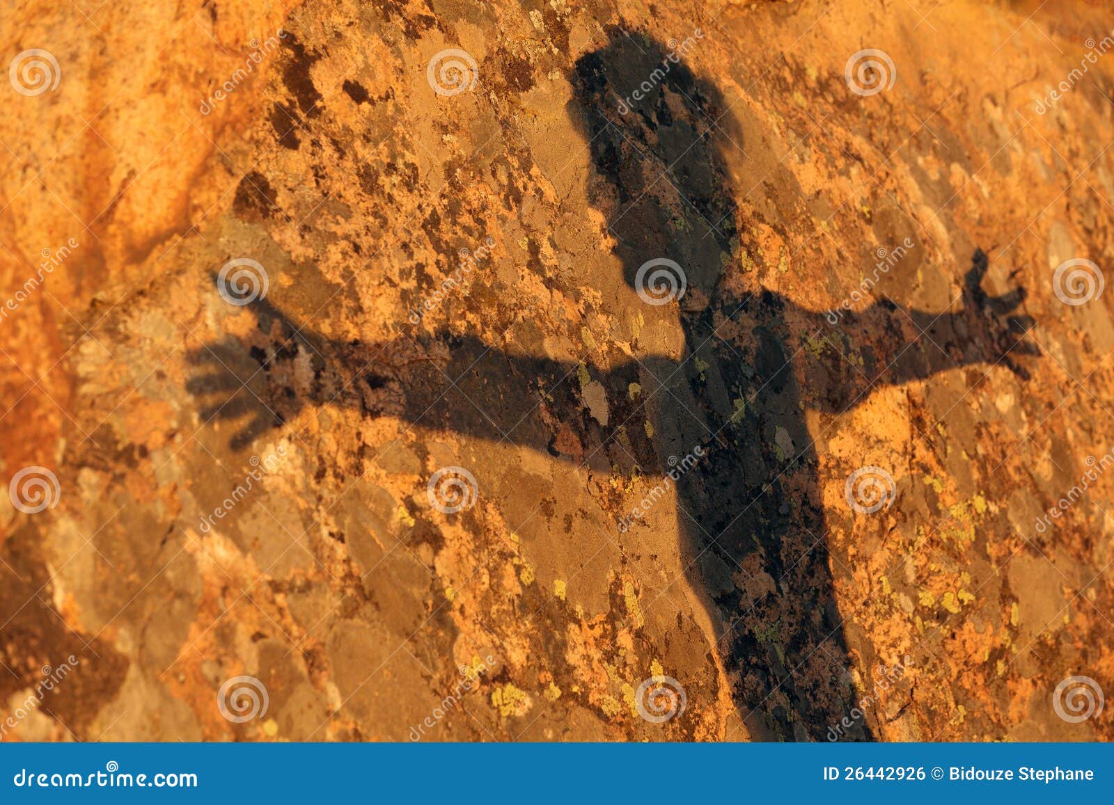 woman shadow on granite wall