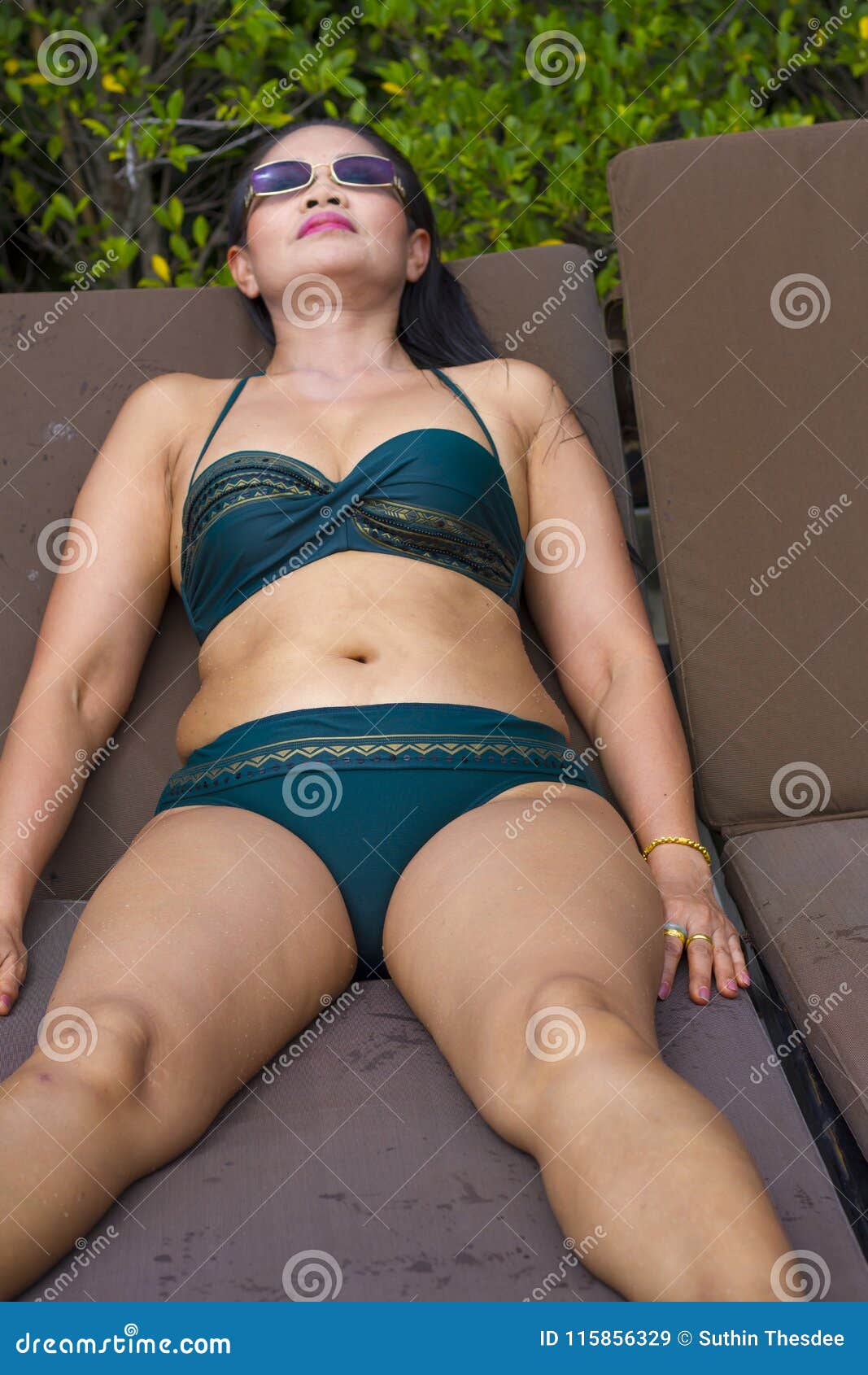 Woman Shape Sex Symbol with Bikini in Swimming Pool Stock Image