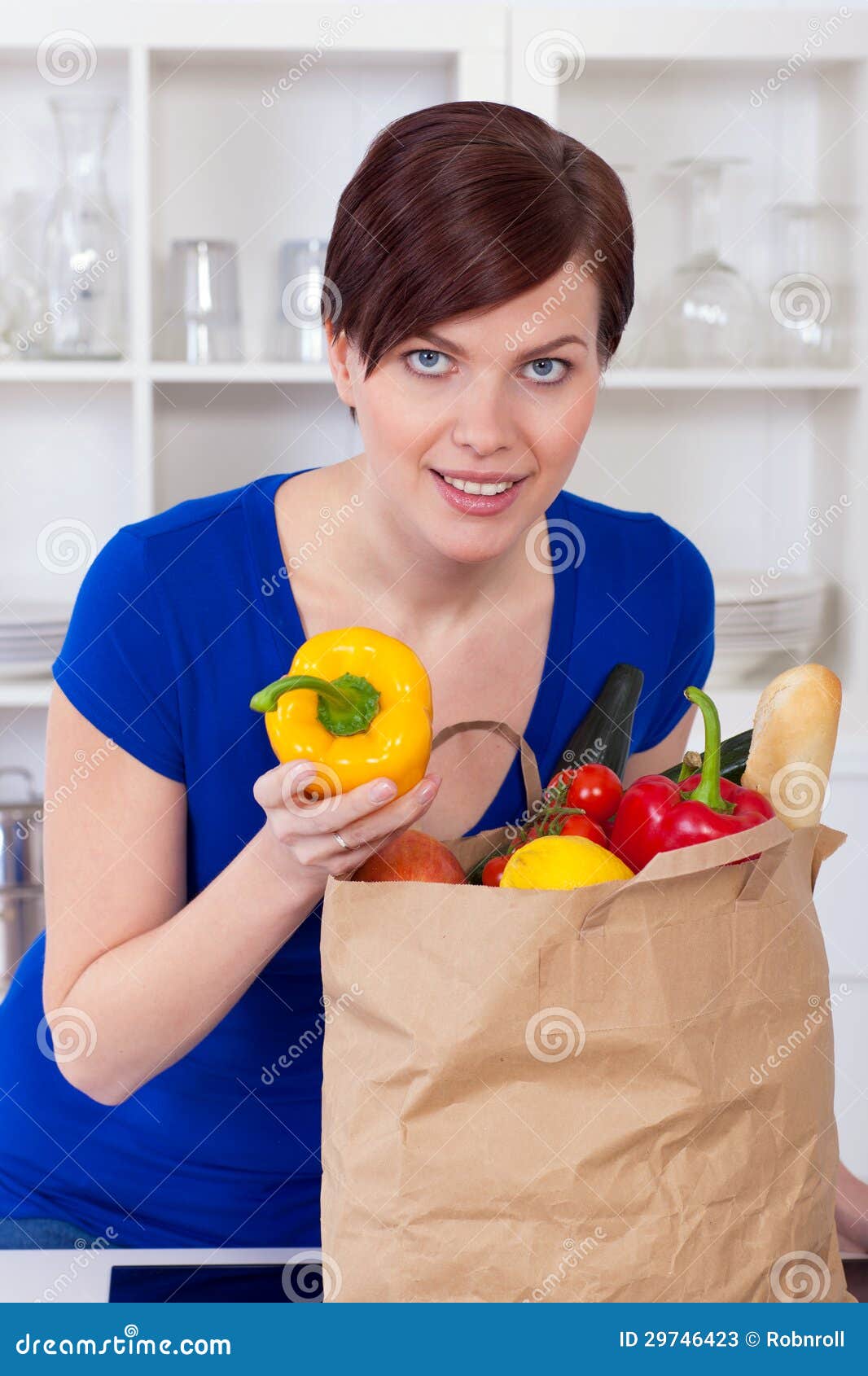 Woman with Shopping Bag in the Kitchen Stock Image Image of green