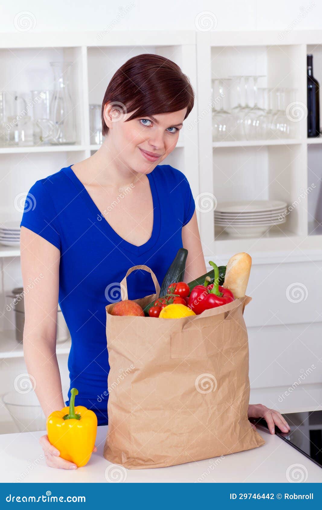 Woman with Shopping Bag in the Kitchen Stock Photo Image of female