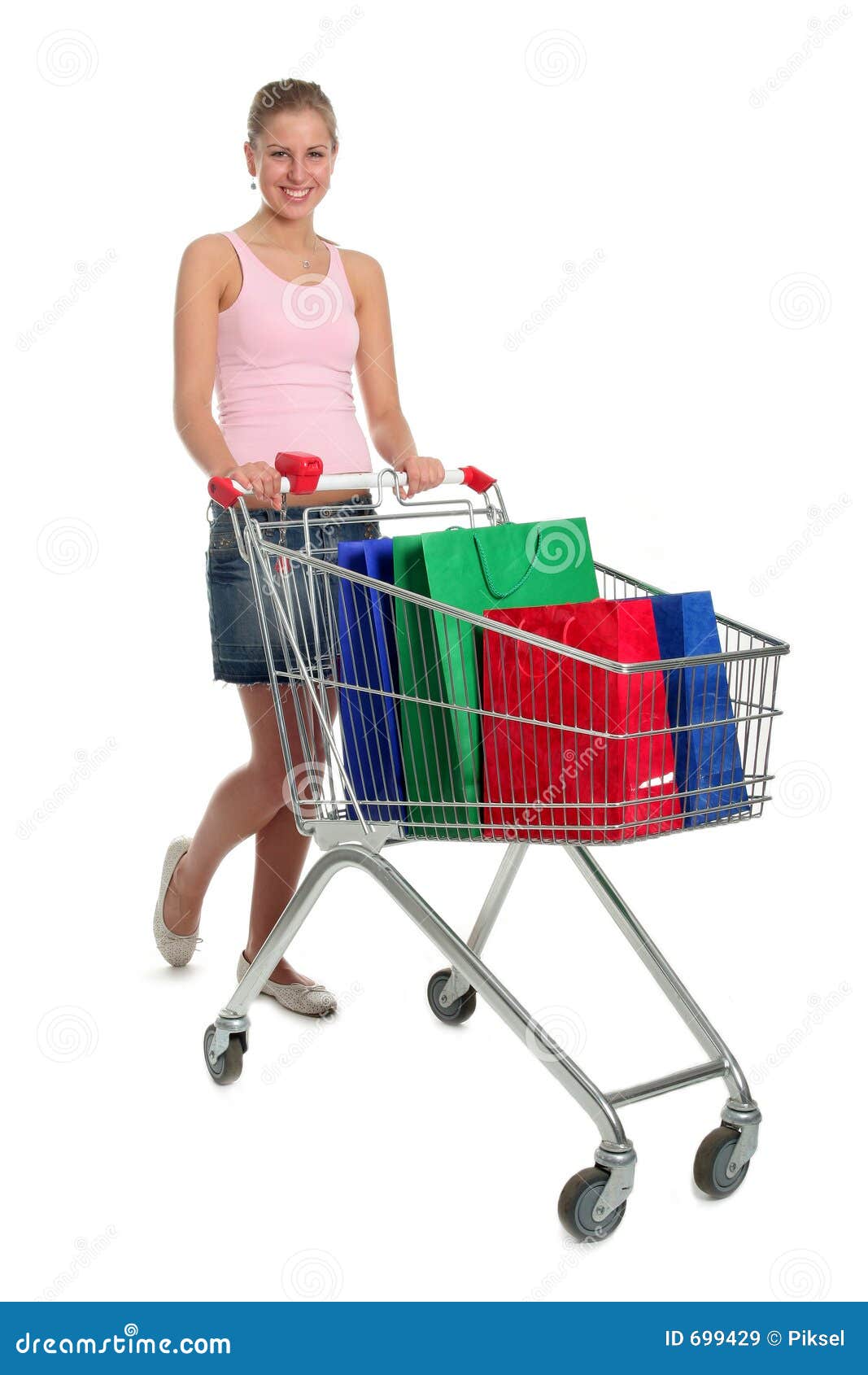 Woman with Shopping Cart stock image. Image of smiling 699429