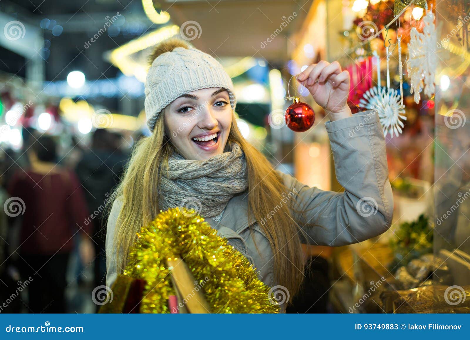 Woman Shopping at Christmas Fair before Xmas in Evening Time Stock ...