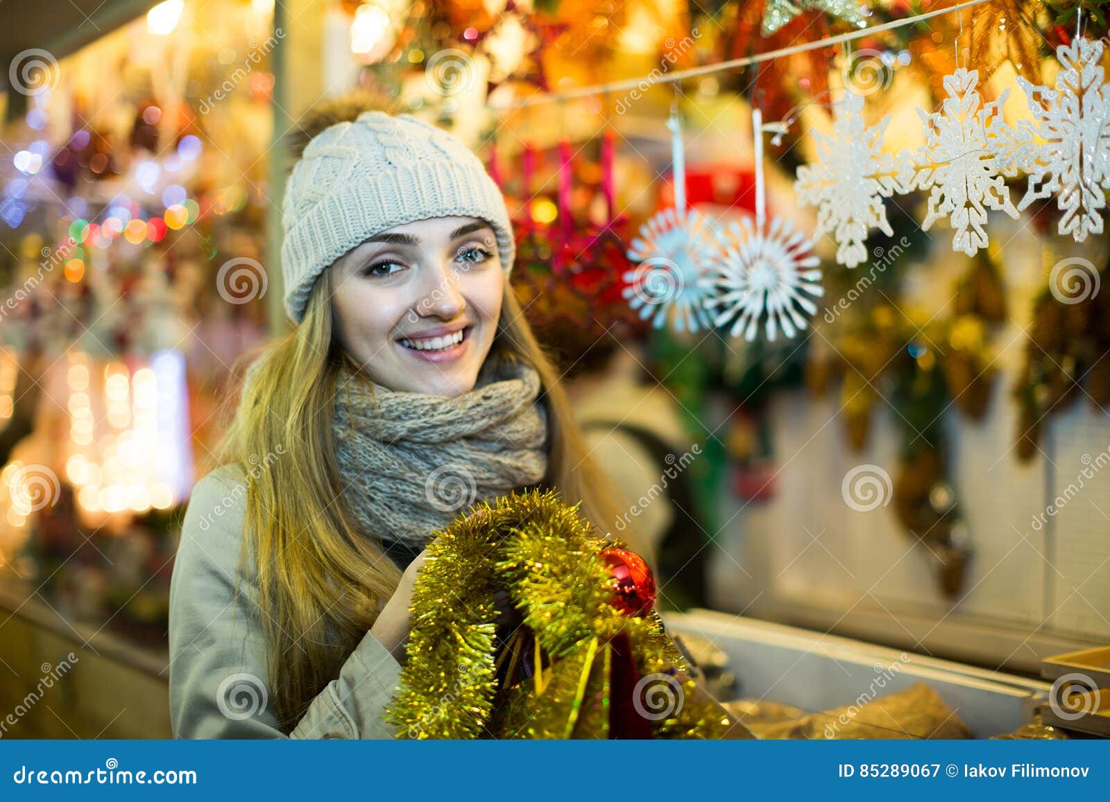 Woman Shopping at Christmas Fair before Xmas in Evening Time Stock ...