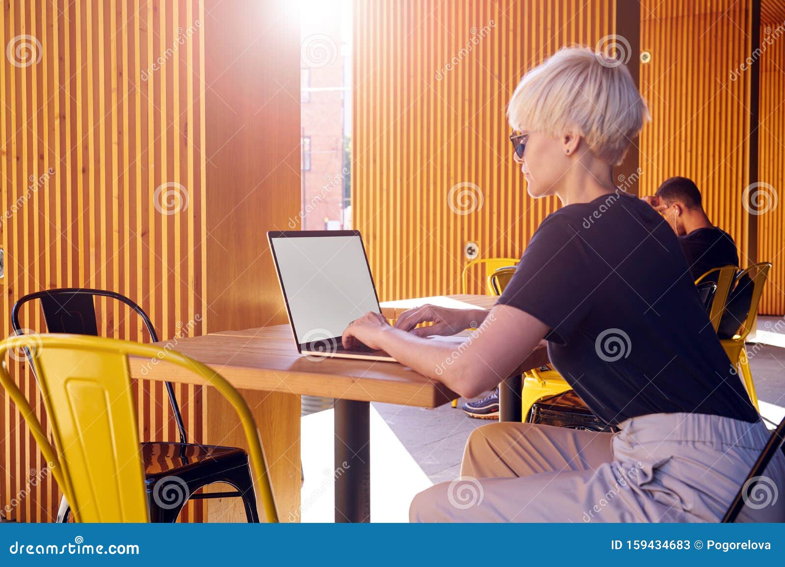 Woman with Short Hair Working on Laptop, Screen Space for Design Layout ...