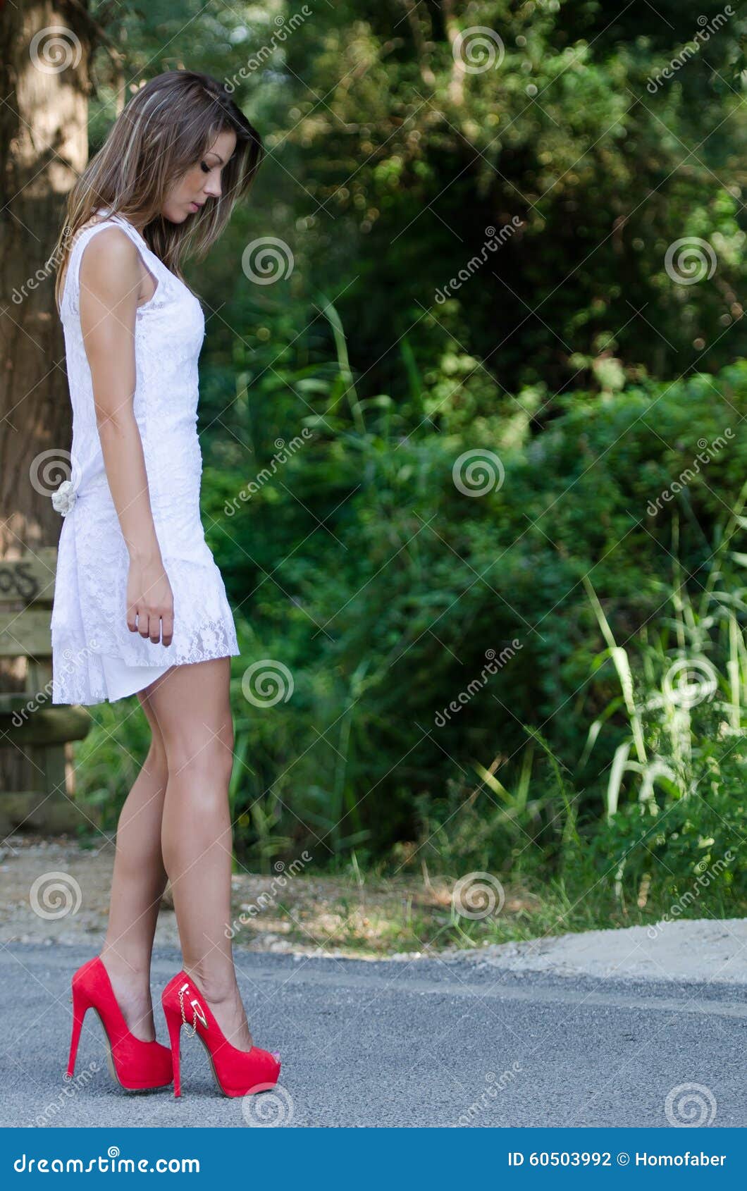 Woman in Short White Dress, Lush Vegetation As Background Stock Photo ...