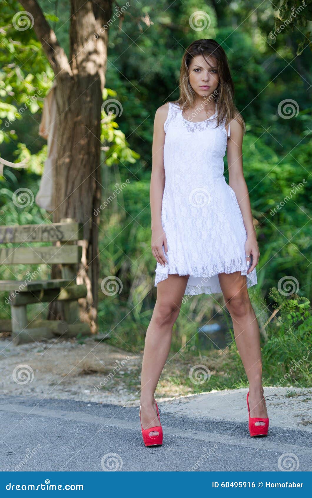 Woman in Short White Dress, Lush Vegetation As Background Stock Photo ...