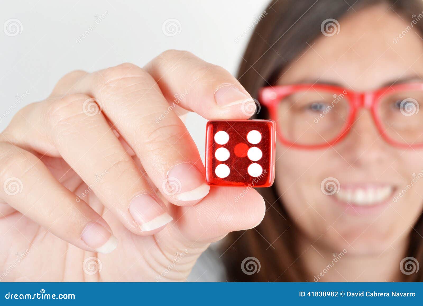 Woman showing dice stock photo. Image of lovely, gambling 41838982