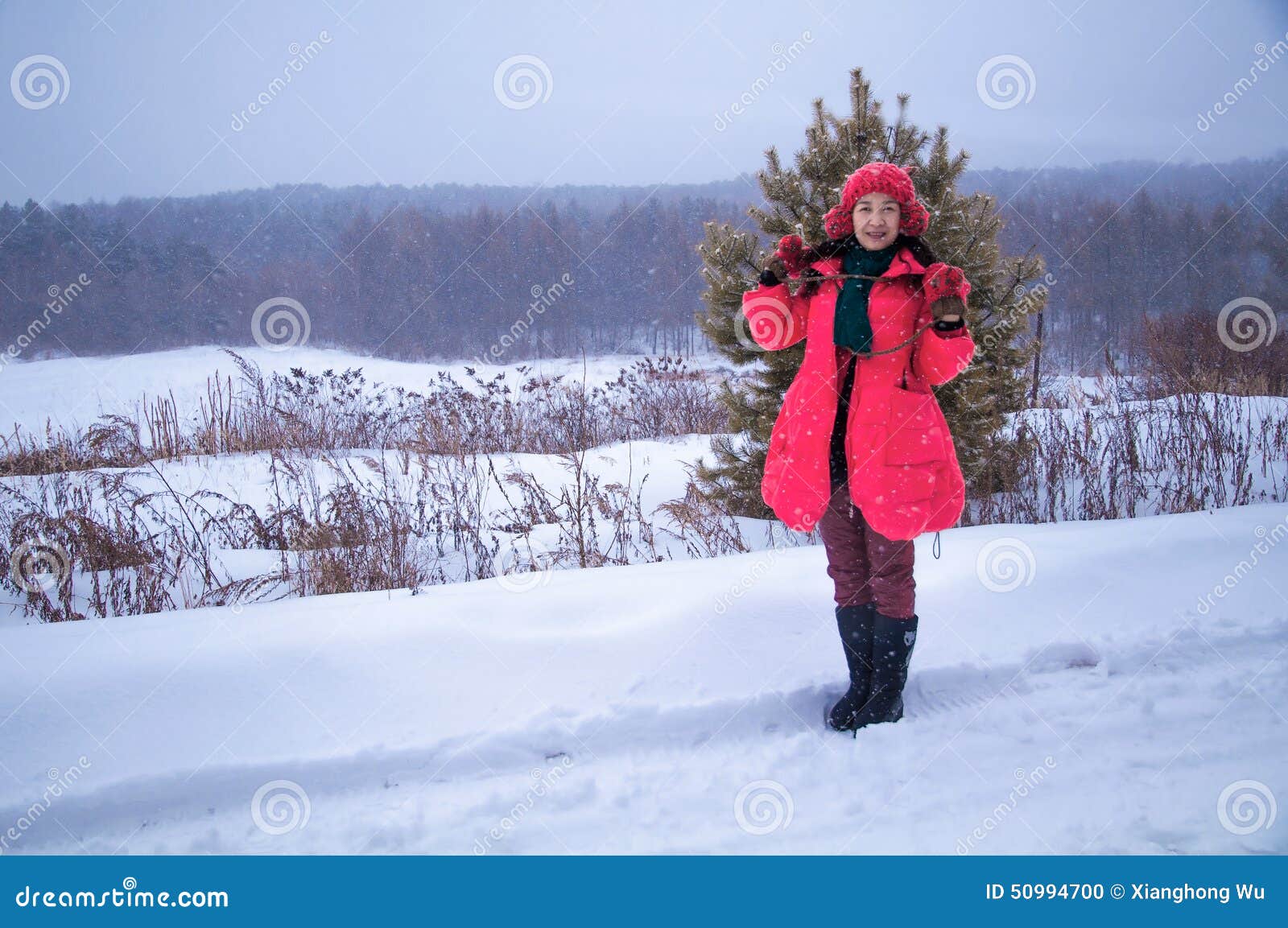 Woman showing in snow stock photo. Image of exercise - 50994700