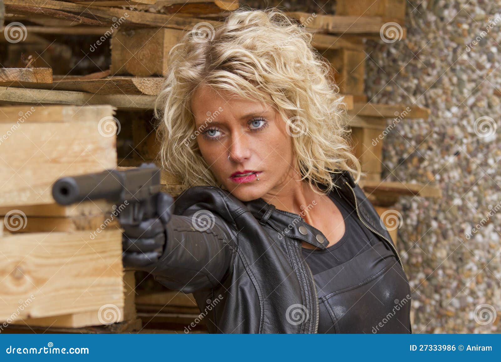 woman with silencer gun