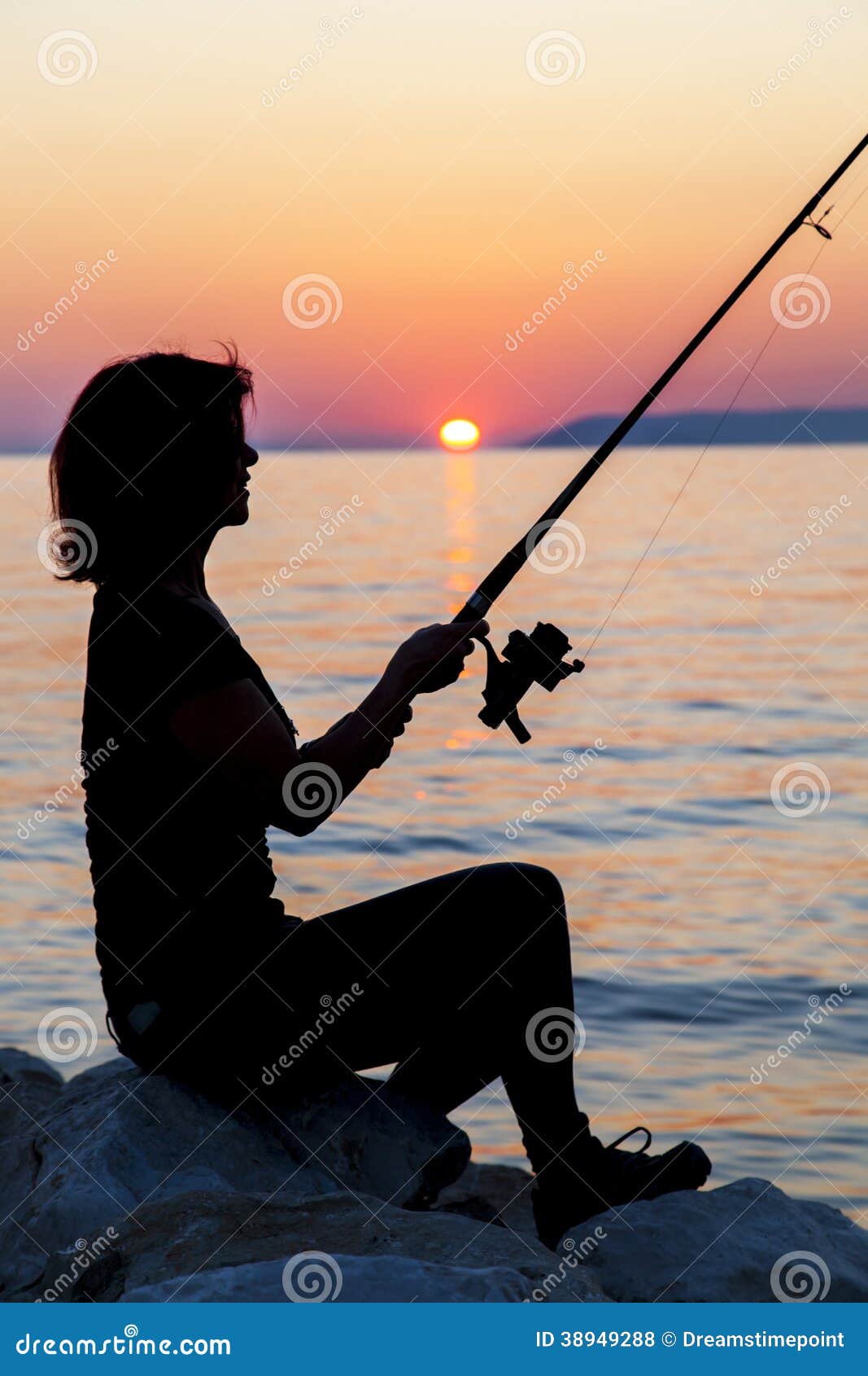 Download Woman Silhouette Fishing On Rock Stock Photo - Image of ...