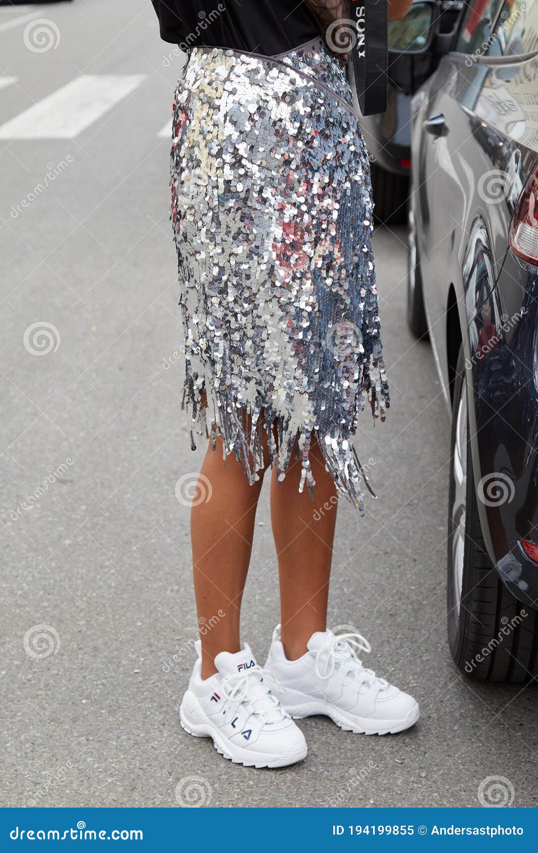 Woman with Silver Sequin Skirt and White Fila Sneakers before Fila Fashion  Show, Milan Fashion Editorial Image - Image of colorful, color: 194199855