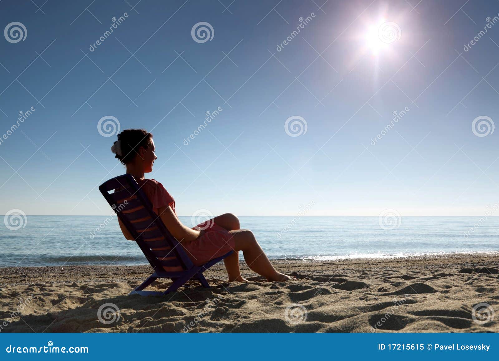 Woman Sits on Plastic Chair Sideways on Beach Stock Image Image of
