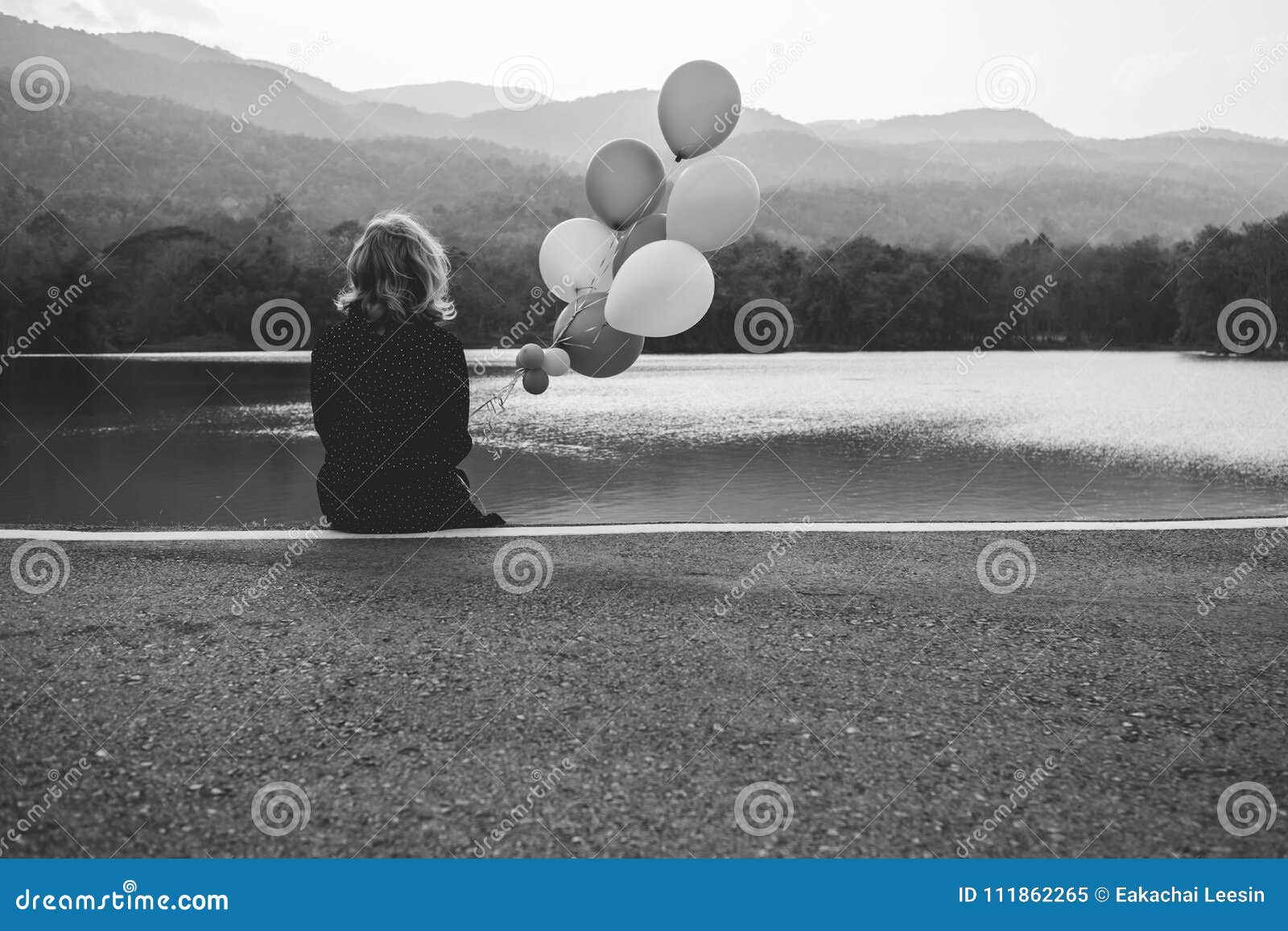 A Women Sitting Alone on the Road Waiting for Love, Alone ...